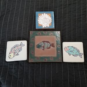 Set Of Four Rustic Coastal Fish Shell Hand Painted Clay Tiles Made In Mexico.